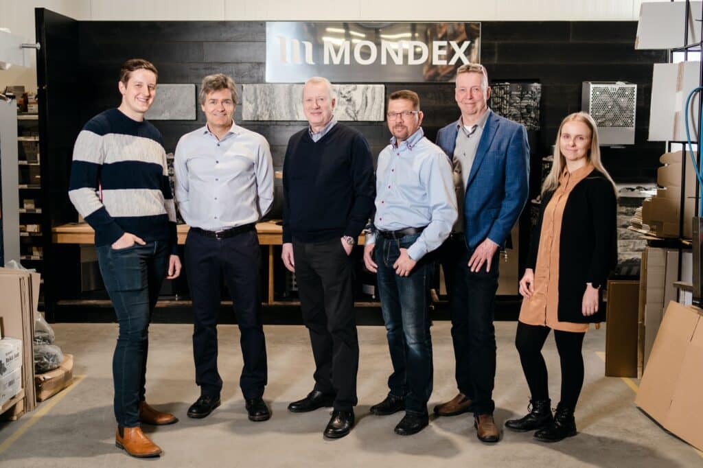 Das Mondex-Team auf einem Gruppenfoto.