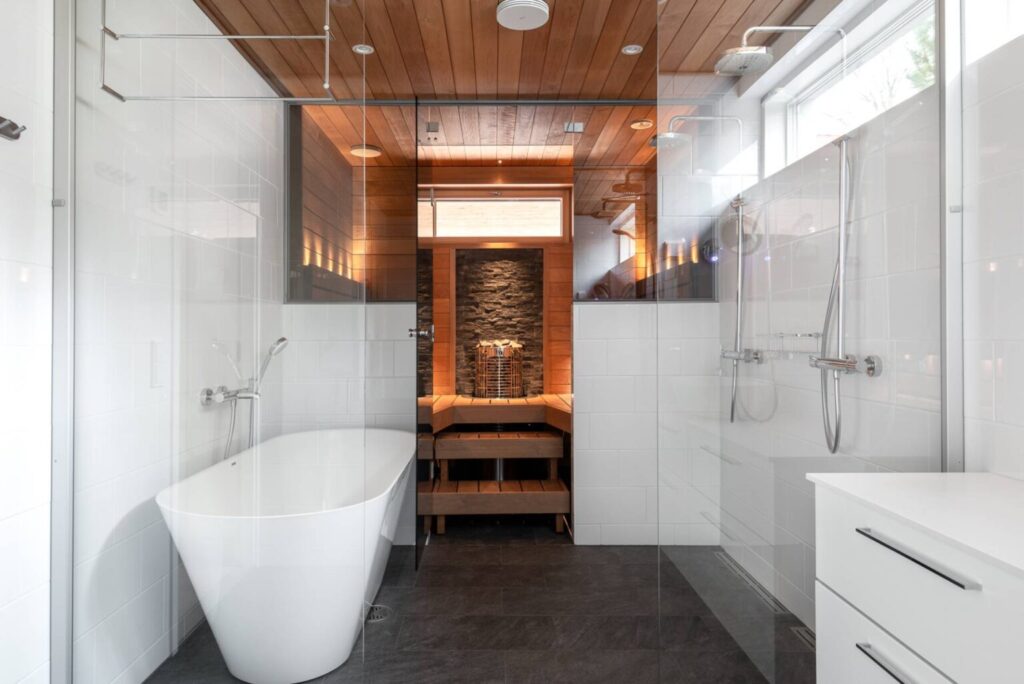 This sauna features a wall-mounted Mondex Kalla floor heater, which takes up only a small amount of space.